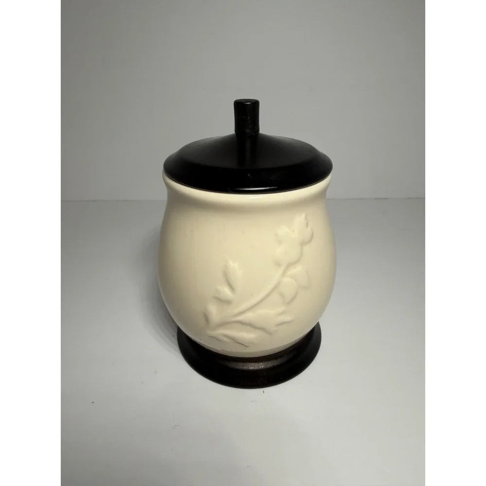 Cream Ceramic Jar with Embossed Floral Vine and Dark Brown Lid and Base